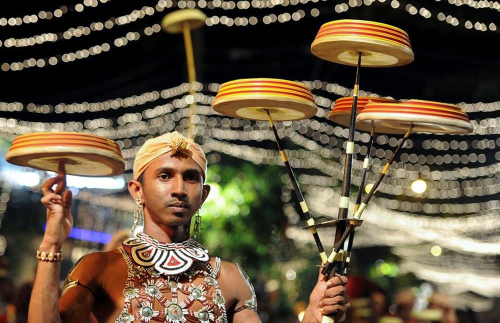 Torch bearers, whip crackers, and flag bearers 5 gangarma nawam maha perahara