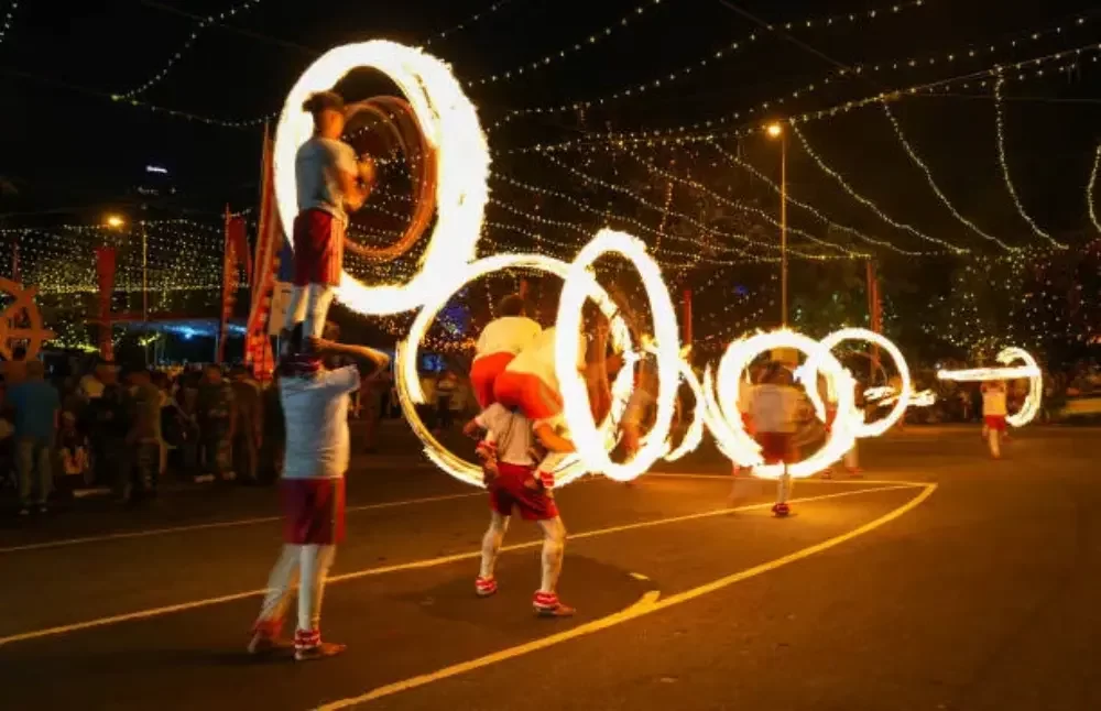 Torch bearers, whip crackers, and flag bearers7 gangarma nawam maha perahara